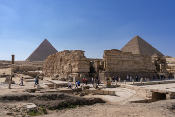 The Great Pyramid of Giza is a defining symbol of Egypt and the last of the ancient Seven Wonders of the World. The massive temple complex of Karnak was the principal religious center of the god Amun. - obrazy, fototapety, plakaty