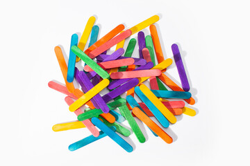 small wooden sticks for children math counting isolated on white background