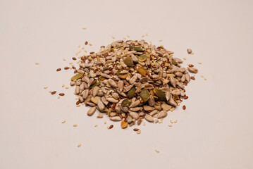Fototapeta na wymiar Mix of seeds for a salad. A pile of mixed seeds.