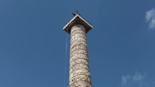 Time lapse of the Column of Marcus Aurelius located in the Piazza Colonna in Rome, Italy.