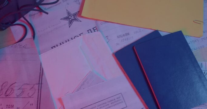 The movement of the camera, the documents of the NKVD worker are on the table. Case number, secret notes, cipher. A dark room. CZ, Kladno, Polska, 19.4.22.