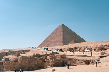 Naklejka na ściany i meble The Great Pyramid of Giza is a defining symbol of Egypt and the last of the ancient Seven Wonders of the World. The massive temple complex of Karnak was the principal religious center of the god Amun.