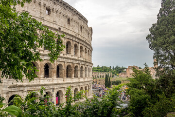 Fototapeta na wymiar Roman Colosseum at Day under cloudy skies in Rome, Italy 01