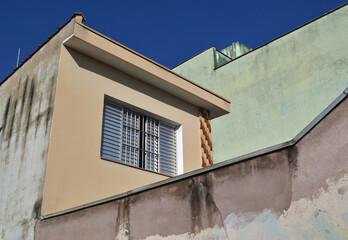Architectural detail geometric shapes with light/shadow and color composition.