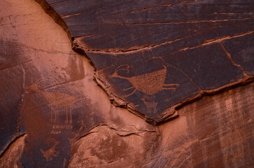 bird hieroglyphic etched into cave wall in a slot canyon in Arizona