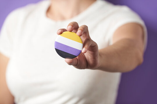 Person Showing A Non Binary Flag Badge; Gender Diversity, Identity Pride