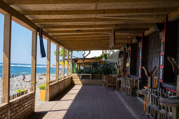 El Tunco, El Salvador - January 29, 2022: Patio of closed restaurant on the beach of El Tunco, El Salvador