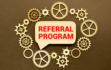 Notebook with Toolls and Notes about Referral Program