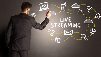 businessman drawing social media icons