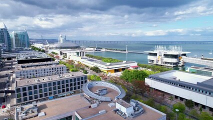 Lisbon, Portugal, April 24, 2022: DRONE AERIAL FOOTAGE: The Parque das Nacoes (Park of Nations), is a neighborhood in Lisbon constructed for the 1998 Lisbon World Exposition.