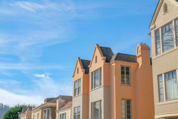 Fototapeta na wymiar Neighborhood residential buildings on a low angle view at San Francisco, California