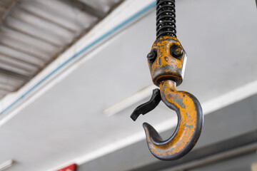 Crane hook. The system of pulleys and ropes. Close up crane hook for overhead crane 
