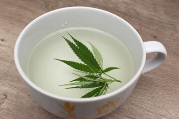 Cannabis leaf tea (or marijuana leaf) is a new alternative. that are beneficial to health serve with clay cups.