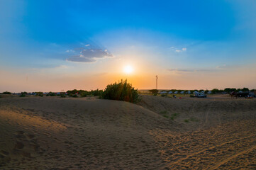 Sun set at Thar desert. Barren land , sand dunes of Jaisalmer, Rajasthan, India.