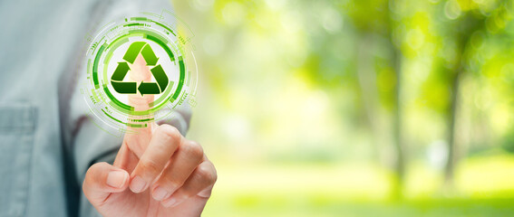 Hand touching on virtual screen recycle icon. Environmental concept recycle - reduce - reuse.