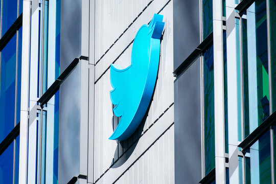 Twitter Bird logo on the headquarters building. Twitter is an American microblogging and social networking service - San Francisco, California, USA - 2022