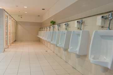 Urinals Men public in toilet room, wc