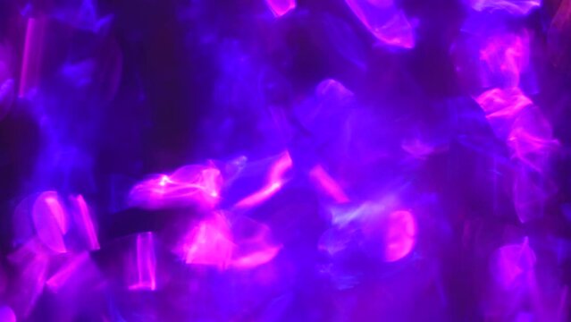 Digital lights, neon glowing rays in motion. Purple pink blue electro retro cyberpunk background