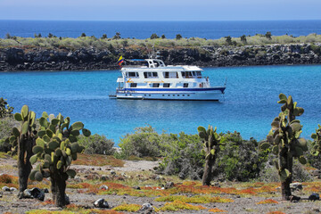 Typical tourist yacht anchored between South Plaza and North Plaza islands, Galapagos National...