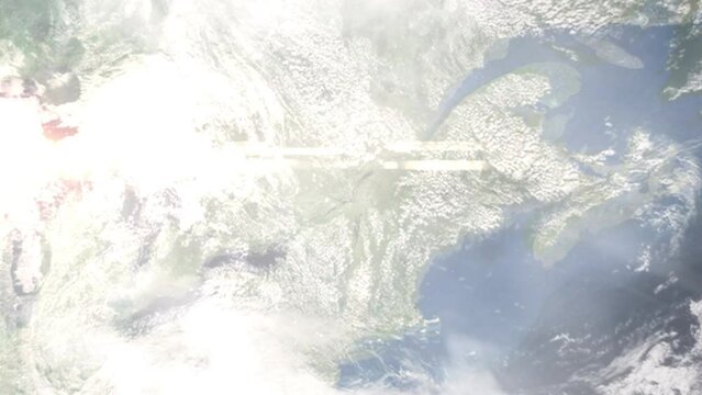 Earth zoom in from outer space to city. Zooming on Longueuil, Quebec, Canada. The animation continues by zoom out through clouds and atmosphere into space. Images from NASA