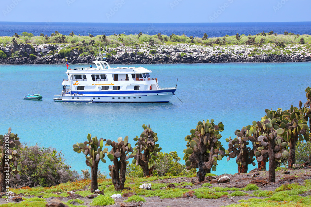 Poster typical tourist yacht anchored between south plaza and north plaza islands, galapagos national park,