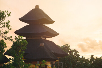 Uluwatu Temple at golden sunset. Bali. Indonesia