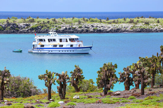 Typical tourist yacht anchored between South Plaza and North Plaza islands, Galapagos National Park, Ecuador.