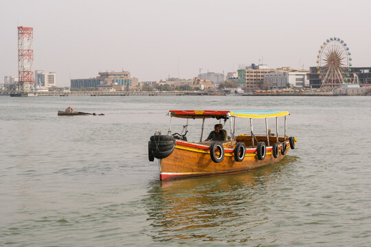 Basra, Iraq - April 15, 2022: landscape photo of the tour in river in basra city