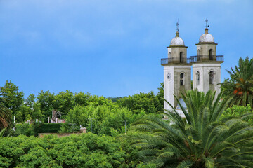 Bell towers of Basilica of the Holy Sacrament in Colonia del Sacramento, Uruguay - obrazy, fototapety, plakaty