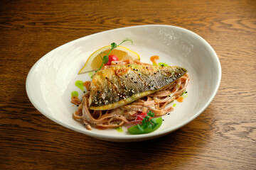 Fried fish fillet with lemon