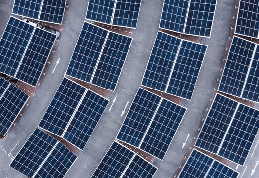 Car parking lot utilising solar panels on a roof