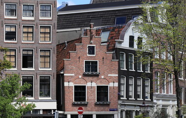 Naklejka premium Amsterdam Noordermarkt Square Brick House Facade with Stepped Gable Close Up, Netherlands