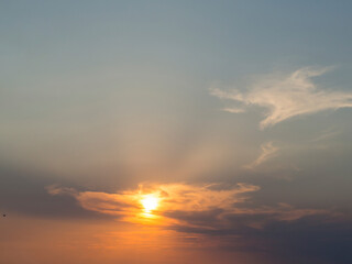 Picturesque view of the sky with clouds during sunset. Beautiful view of the cloudy sky at sunset. Fantastic bright clouds in the sunset sky. Sky background