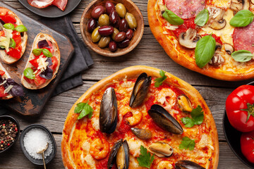 Italian cuisine. Pizza and toasts