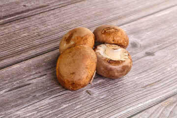 Raw brown champignons mushroom heap