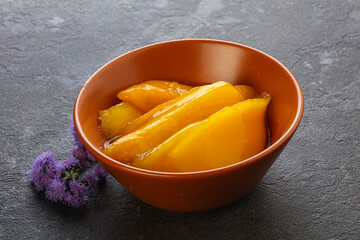 Sweet canned tropical fruit mango