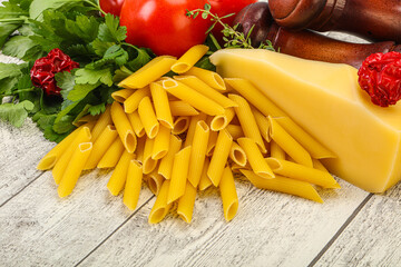 Raw penne rigate for cooking