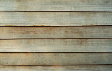Fototapeta premium brown old wooden house background with jagged cracks for wallpaper.
