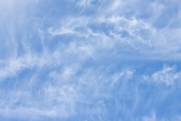 Fototapeta premium blue sky with white clouds and sun light. Nature background of sky