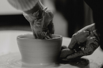 Black and white pottery hands