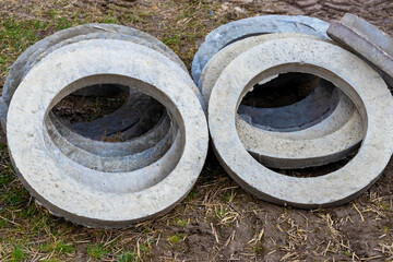 Reinforced concrete rings for the installation of underground wells at the construction site. Reinforced concrete products for the device of underground communications. Sewerage and plumbing.