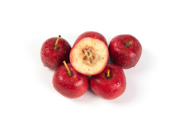 cut of hawthorn fruits isolated on white backgrounds.