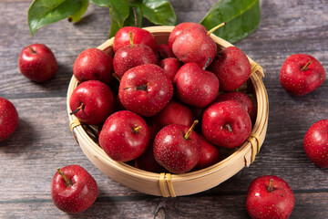 ripe hawthorn fruits on table