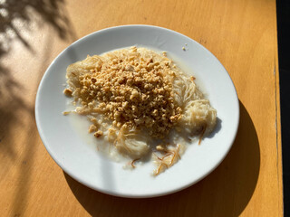 Traditional Turkish Dessert Kadayif  with Milk and Hazelnut Powder. Sutlu Nuriye.