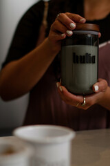 person with cup of coffee