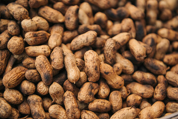 Peanuts that are roasted whole by heat as a snack food.