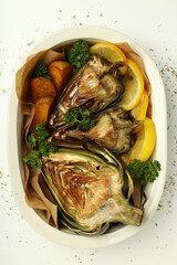 Concept of tasty food with grilled artichoke, top view
