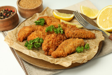 Concept of tasty food with chicken strips, close up