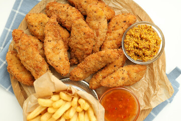 Concept of tasty food with chicken strips, top view