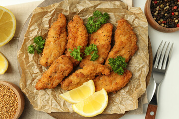 Concept of tasty food with chicken strips, top view